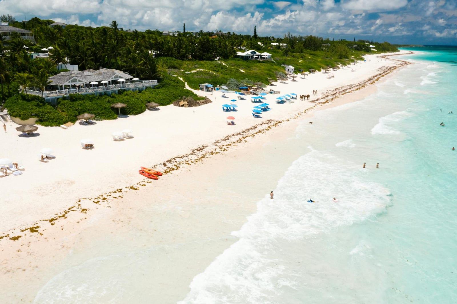 Conch crack on a Bahamian beach, Bahamas