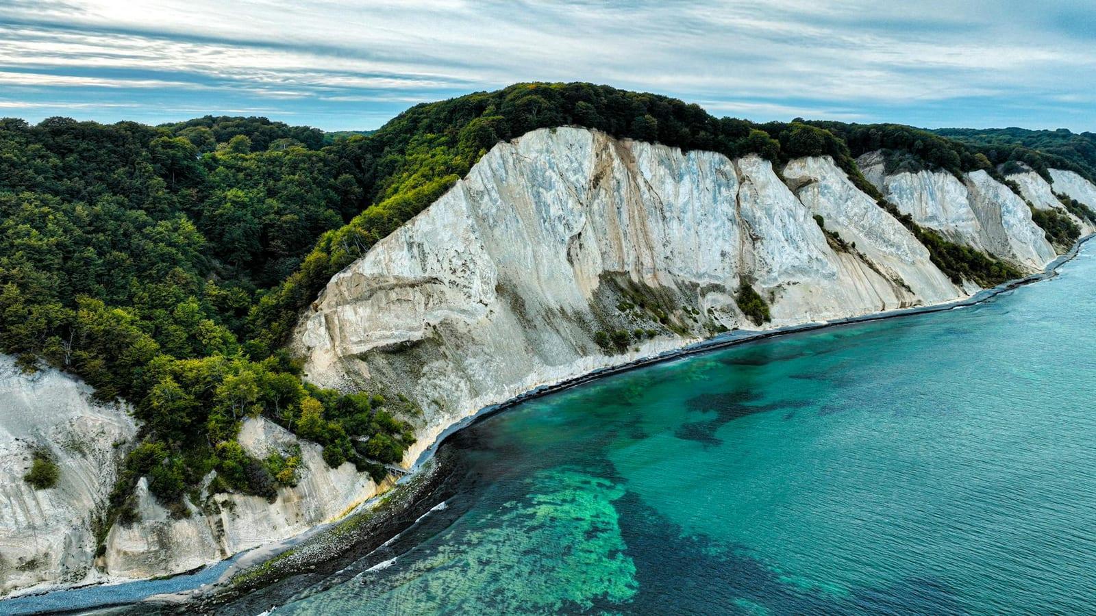 Stand atop Møns Klint chalk cliffs, Denmark