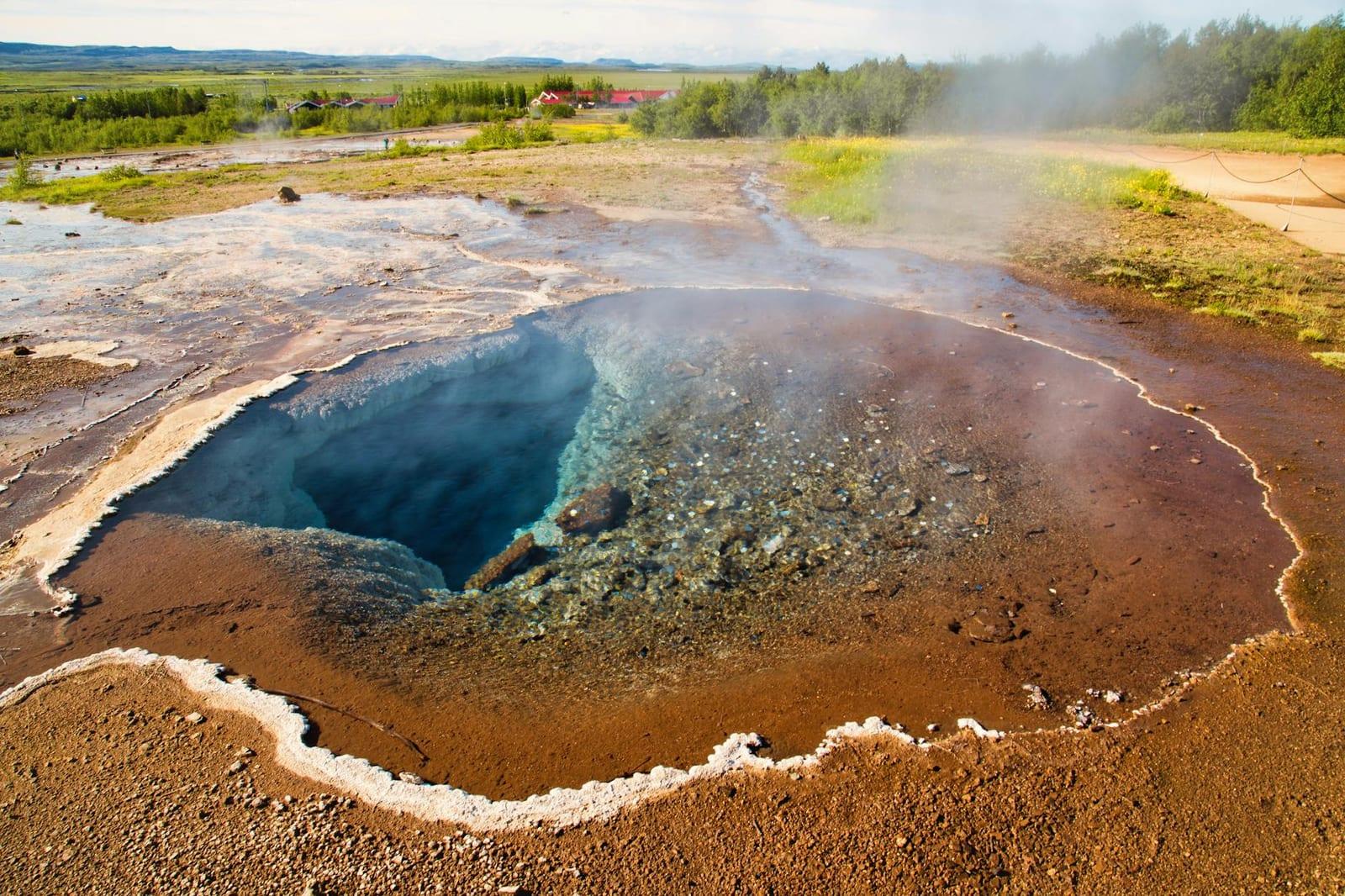 a wild geothermal pool, Iceland