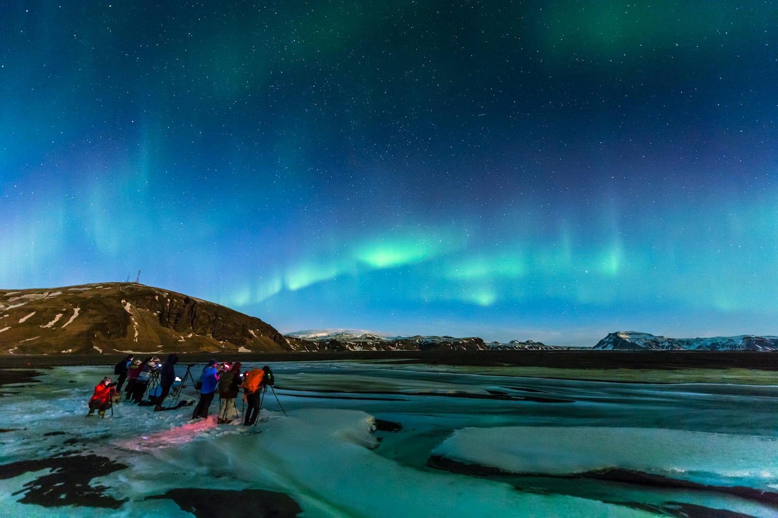 Photograph the aurora from a glacier, Iceland
