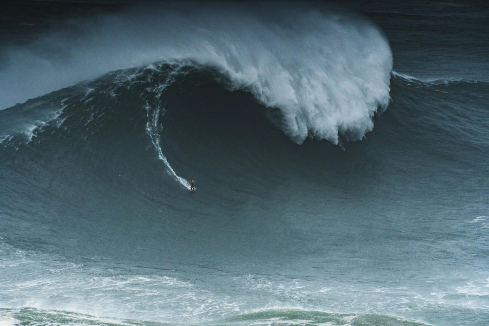 Surf Nazaré's giants (or just watch), Portugal